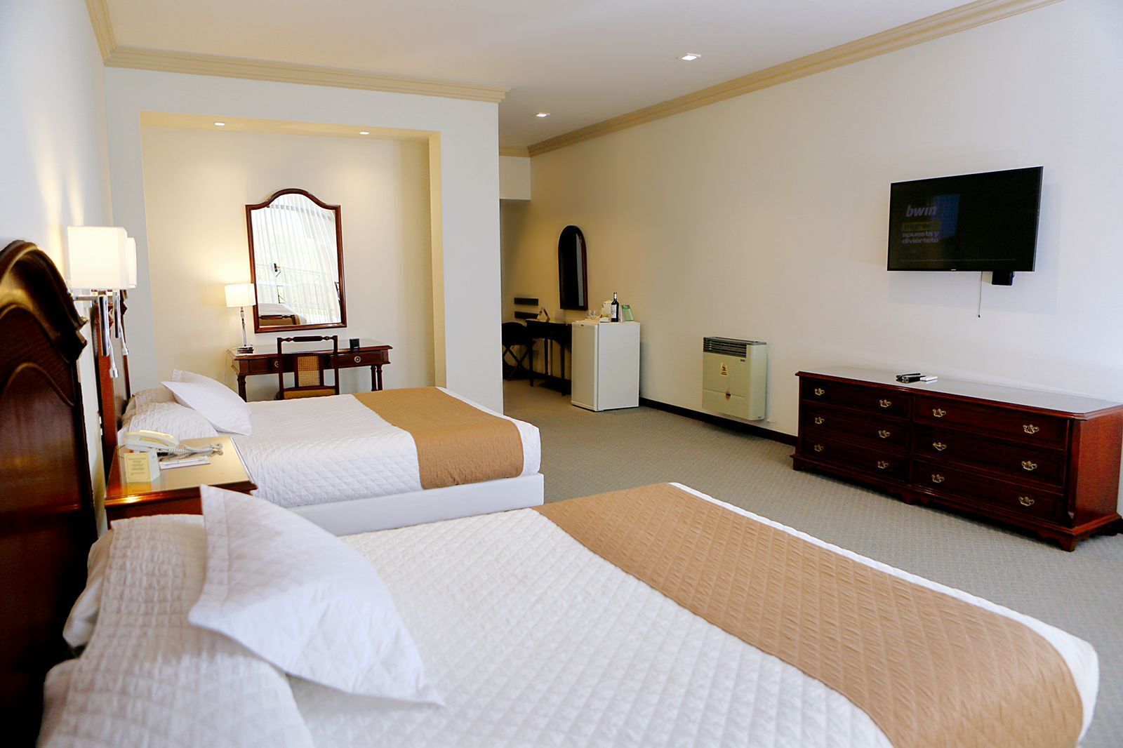 superior double room, 2 queen beds | minibar, in-room safe, individually furnished, desk