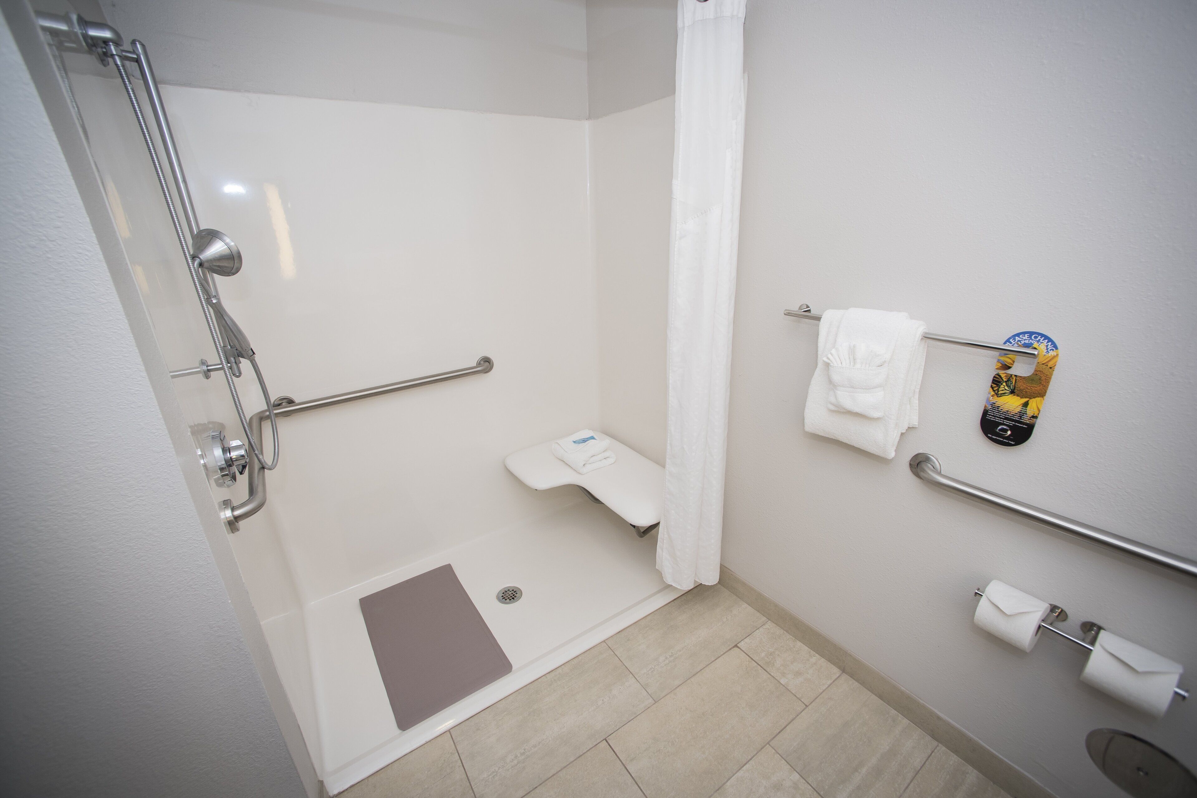 combined shower/bathtub, free toiletries, hair dryer, towels