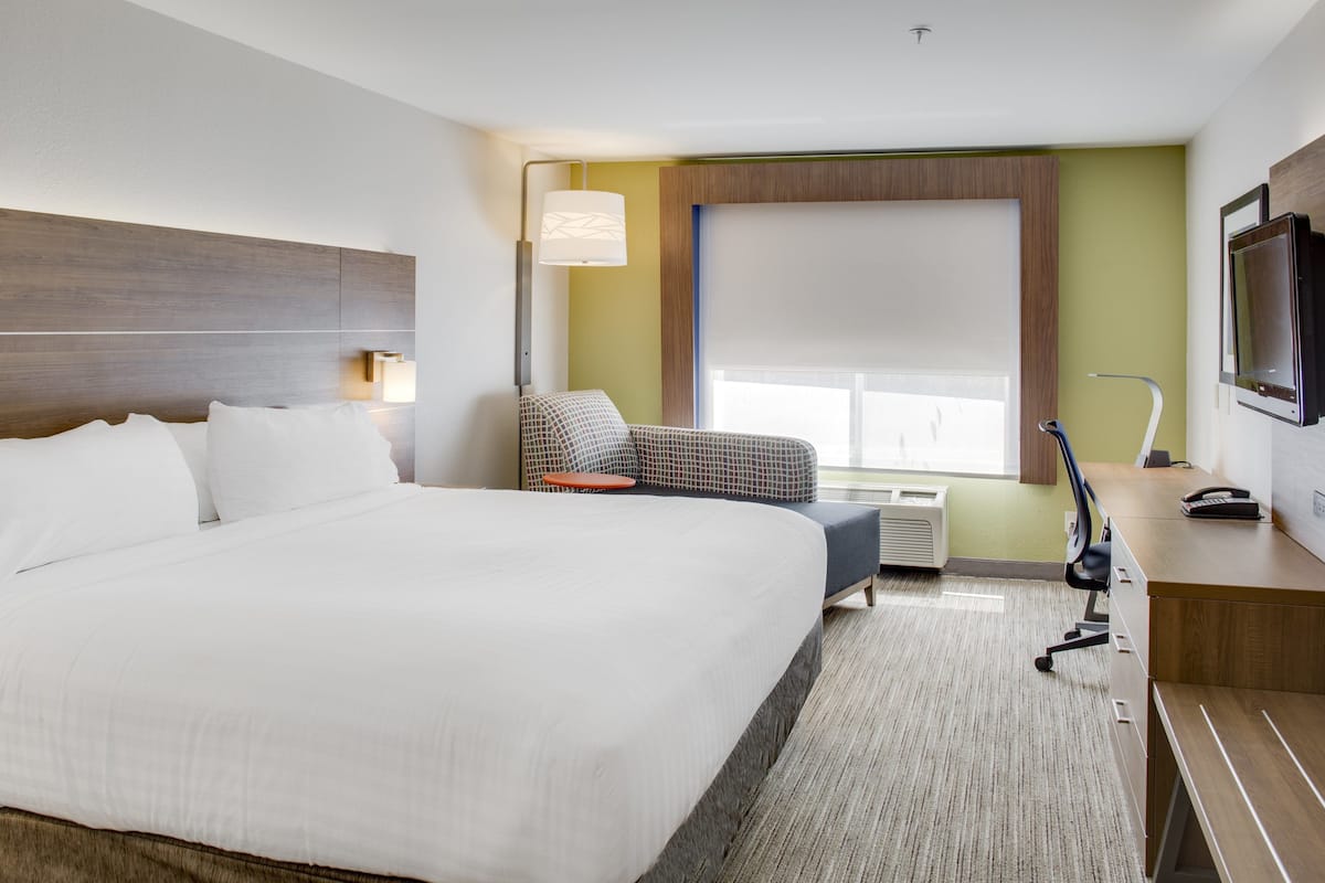 In-room safe, desk, iron/ironing board, cribs (free)