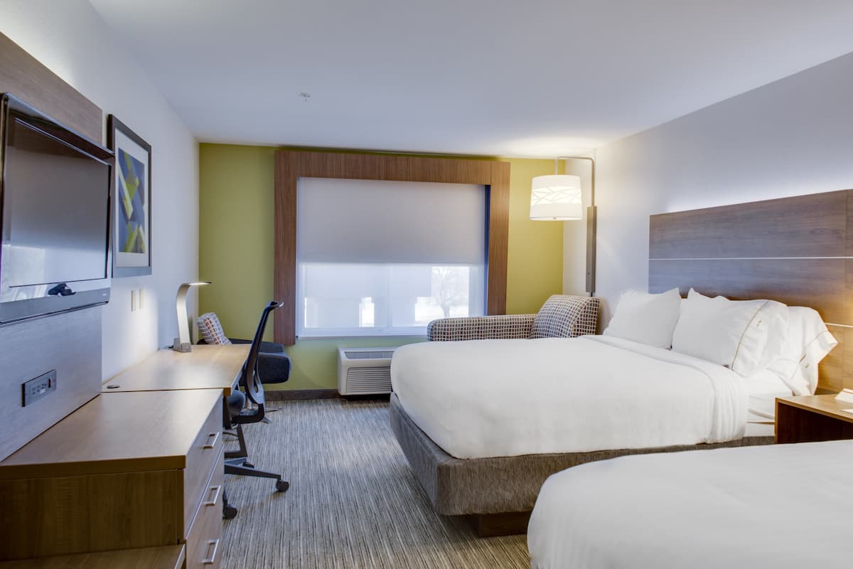 In-room safe, desk, iron/ironing board, cribs (free)