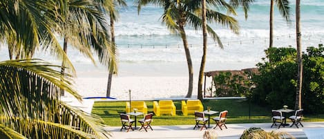 On the beach, white sand, free beach cabanas, sun-loungers