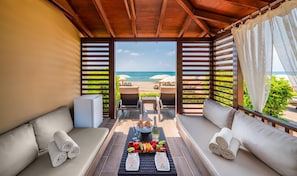 On the beach, sun-loungers, beach umbrellas, beach towels