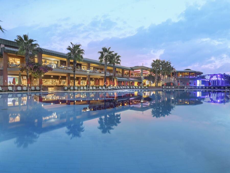 2 indoor pools, 3 outdoor pools, open 7:00 AM to 7:30 PM, pool umbrellas