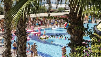 2 indoor pools, 3 outdoor pools, open 7:00 AM to 7:30 PM, pool umbrellas