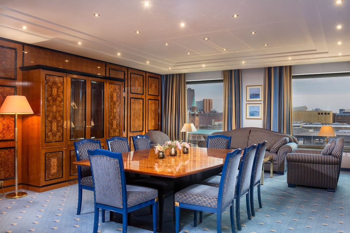 Club Suite, 1 Bedroom (Ambassador) | Living room | 45-inch Smart TV with satellite channels, TV