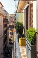 Deluxe Quadruple Room, Balcony, City View | Balcony