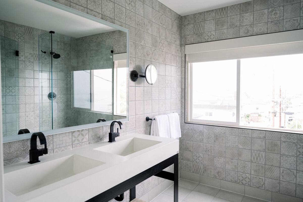 signature room, 1 king bed with sofa bed, balcony, ocean view | bathroom | shower, eco-friendly toiletries, hair dryer, towels