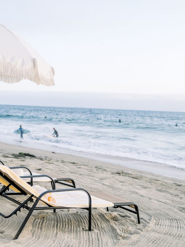 On the beach, sun loungers, beach umbrellas, beach towels