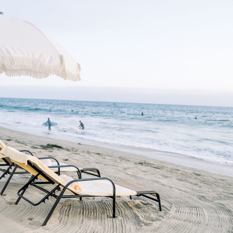 On the beach, sun loungers, beach umbrellas, beach towels