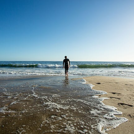On the beach, sun loungers, beach umbrellas, beach towels