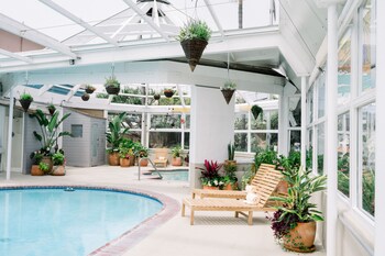 Outdoor pool, open 9:00 AM to 10:00 PM, sun loungers at Laguna Surf Lodge by SCP Hotels