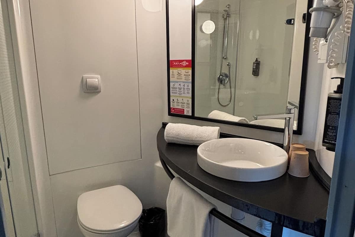 shower, eco-friendly toiletries, hair dryer, towels