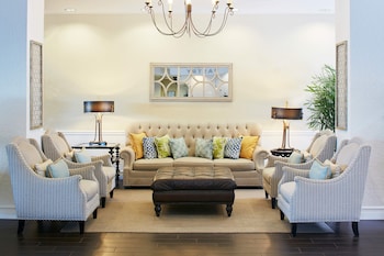 Hotel entrance and lobby at Bluegreen Vacations Fountains, an Ascend Collection Resort