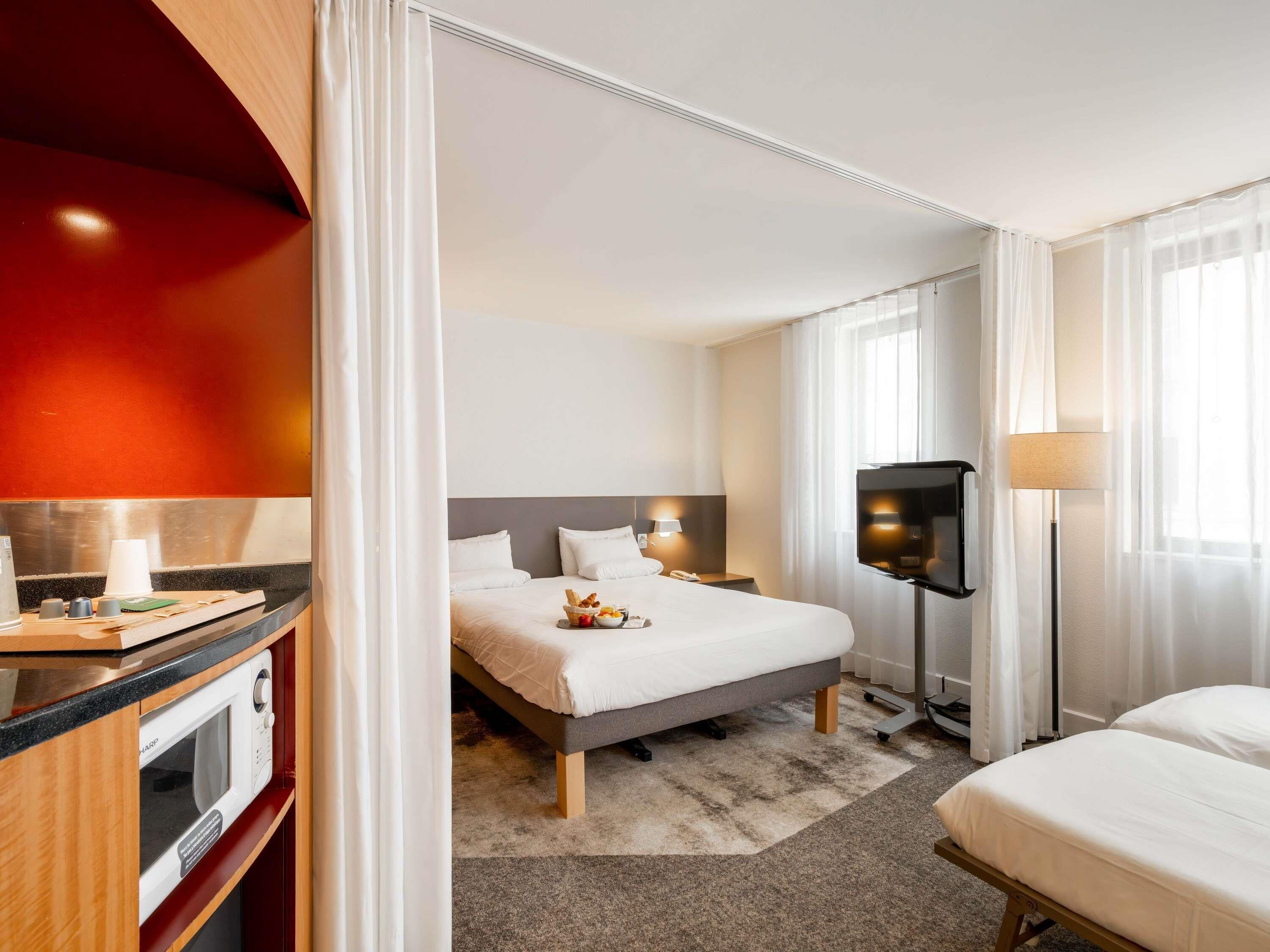 superior suite, multiple beds | premium bedding, minibar, in-room safe, desk
