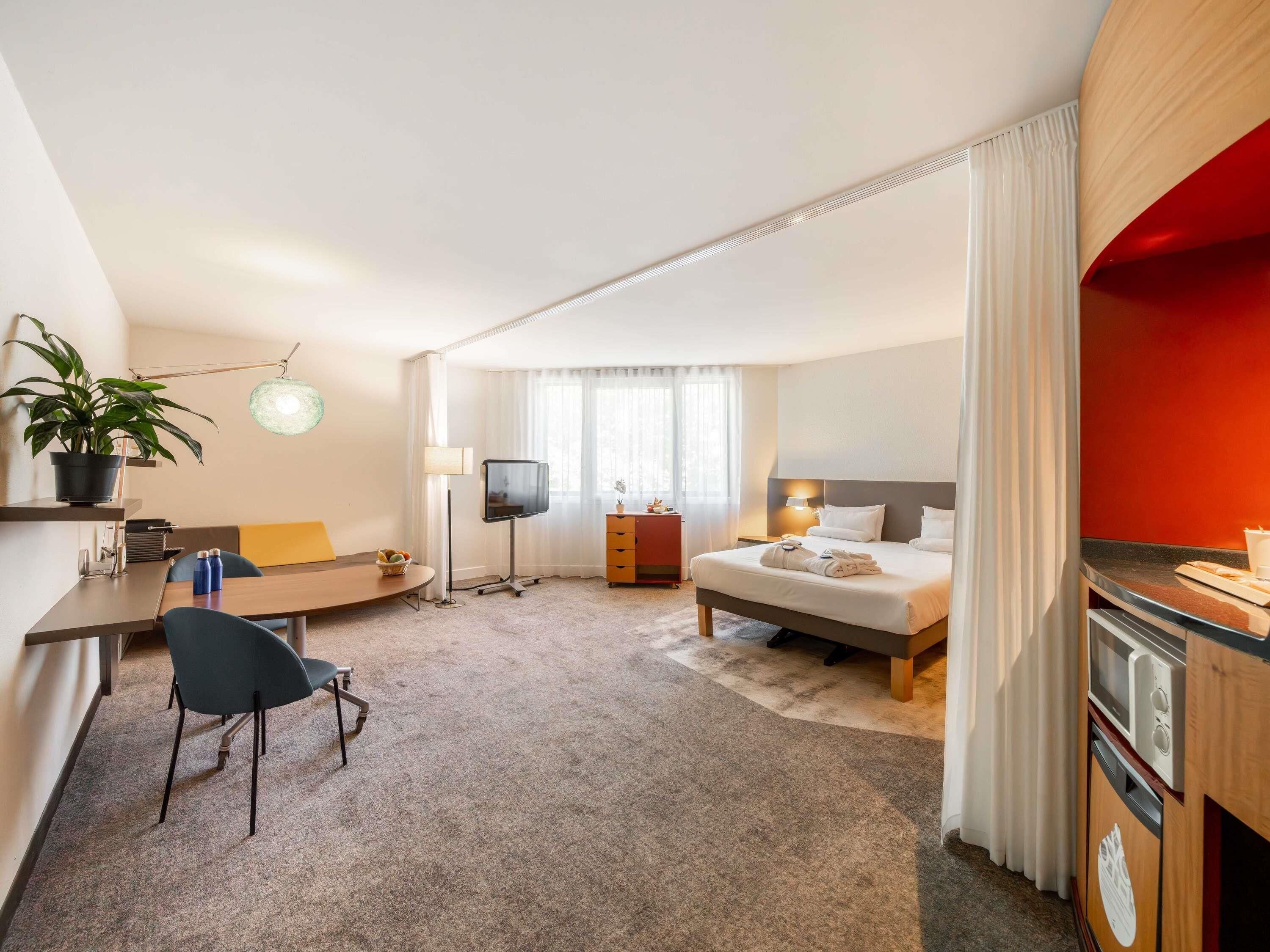 Executive-Suite, 1 Schlafzimmer | Hochwertige Bettwaren, Minibar, Zimmersafe, Schreibtisch