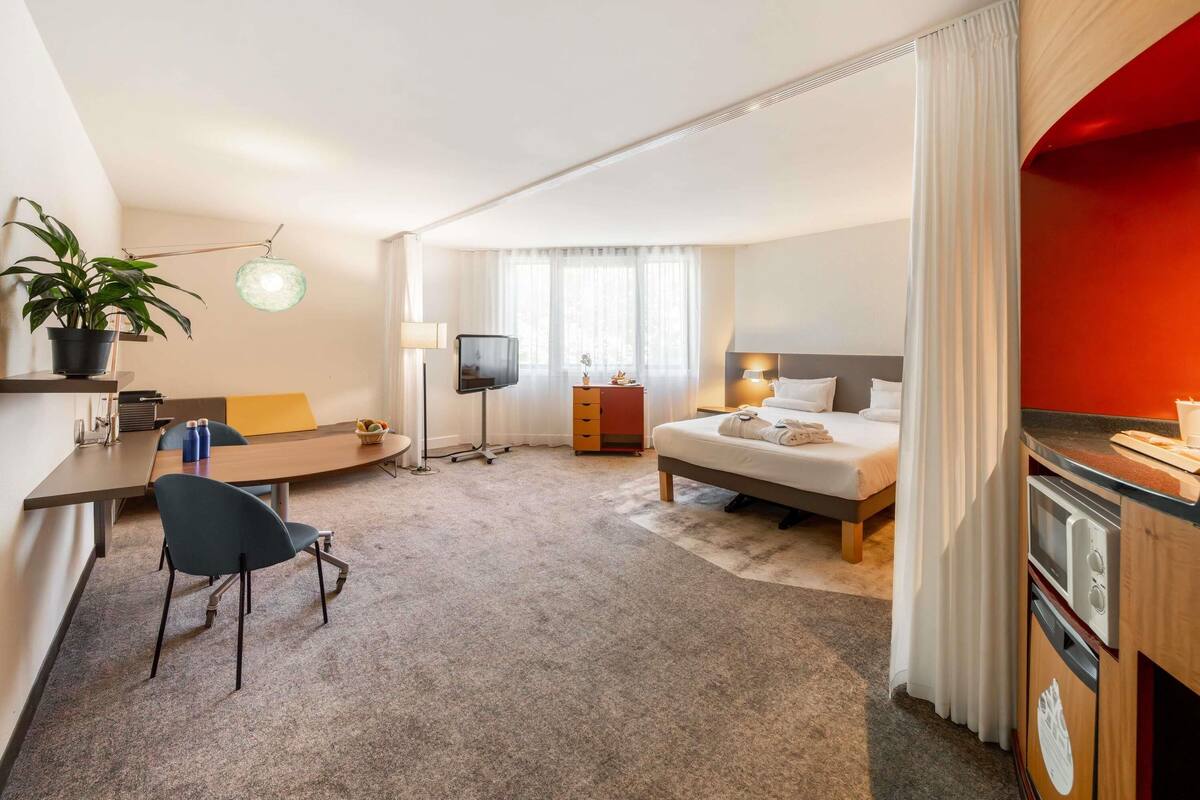 Suite – executive, 1 soverom | Sengetøy av topp kvalitet, minibar, safe på rommet og skrivebord