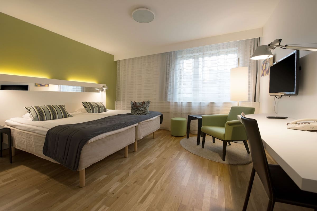 twin room | hypo-allergenic bedding, desk, laptop workspace, iron/ironing board