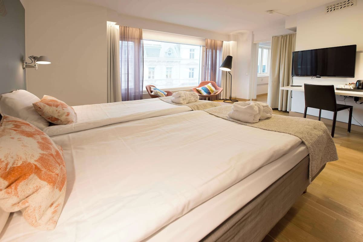 junior suite | hypo-allergenic bedding, desk, laptop workspace, iron/ironing board