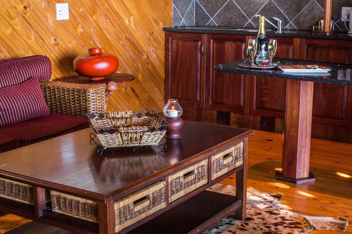 suite, 1 king bed, ocean view | living area | 74-inch tv with satellite channels