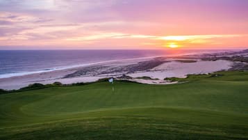 Golfers can enjoy a scenic round amidst well-maintained fairways and sand bunkers with ocean views.