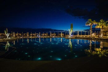 2 outdoor pools, pool umbrellas, sun loungers at Pueblo Bonito Pacifica Golf & Spa Resort -All Inclusive-Adult Only