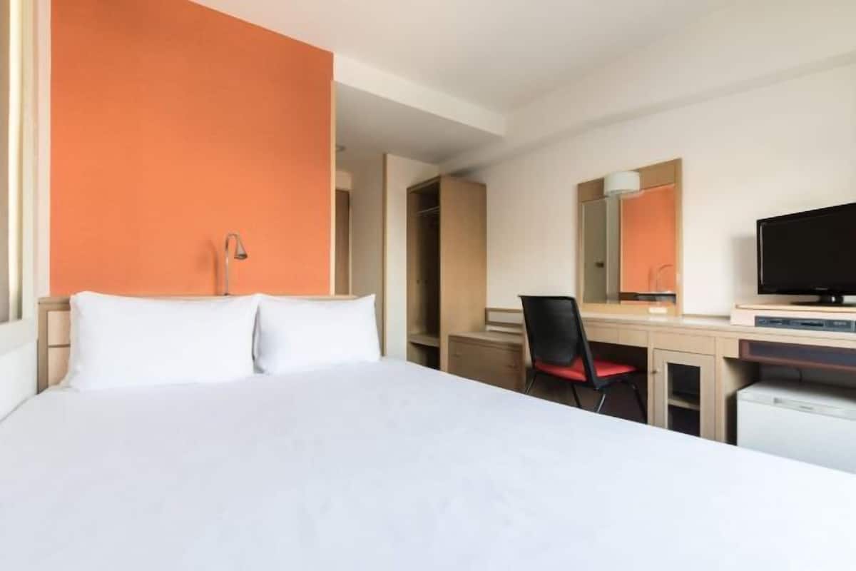 Desk, blackout curtains, iron/ironing board (on request), free WiFi