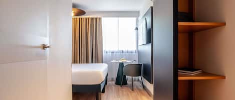 Desk, laptop workspace, blackout drapes, soundproofing