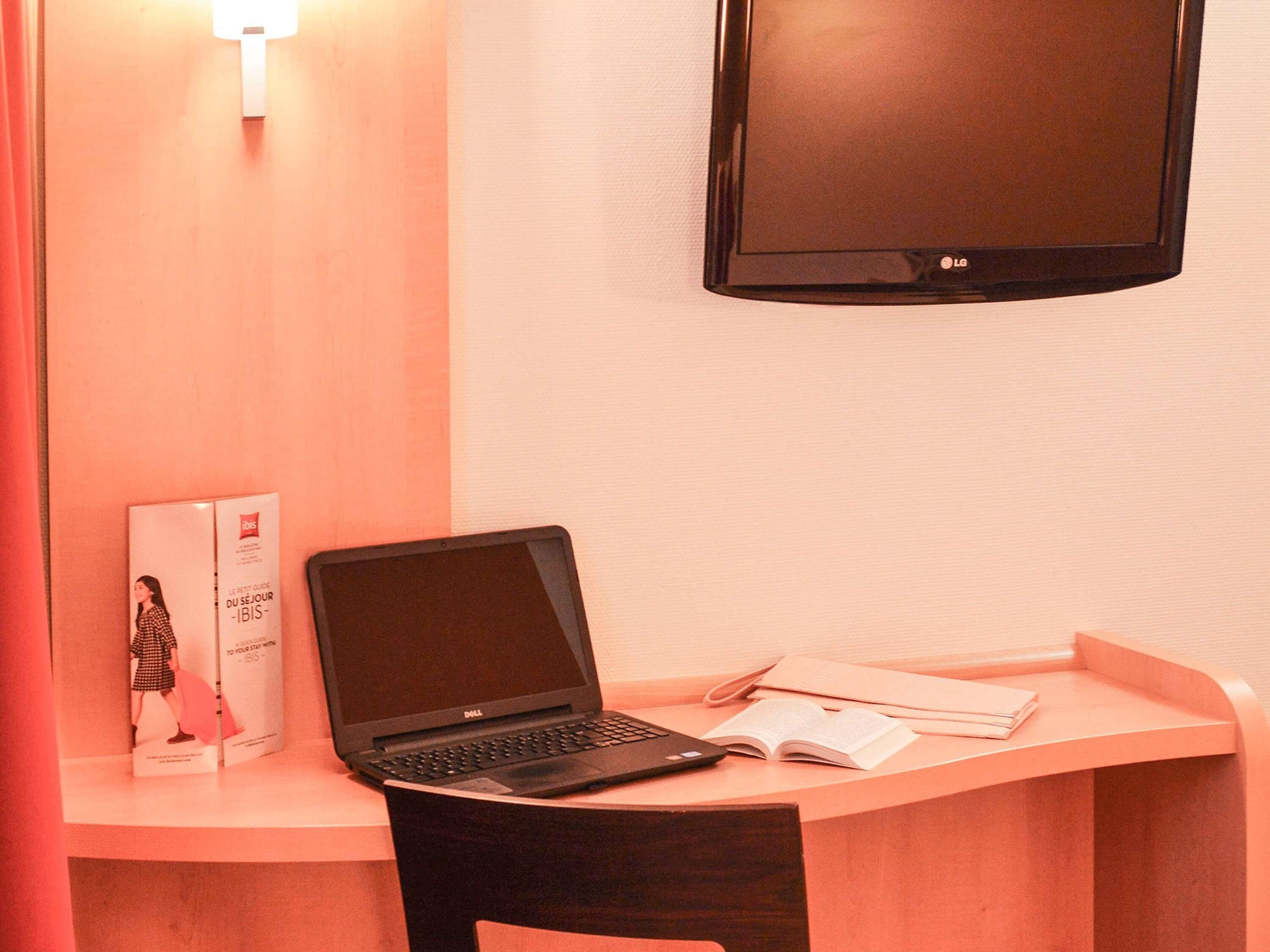 Desk, laptop workspace, blackout drapes, soundproofing