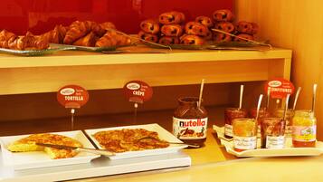 Desayuno buffet (EUR 12.90 por persona)