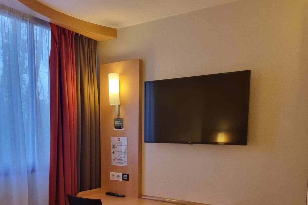 Desk, laptop workspace, blackout curtains, soundproofing