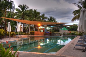 Outdoor pool, pool umbrellas, sun loungers
