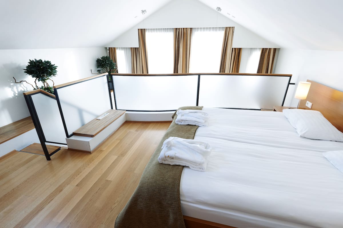 junior suite | 1 bedroom, hypo-allergenic bedding, in-room safe, blackout curtains