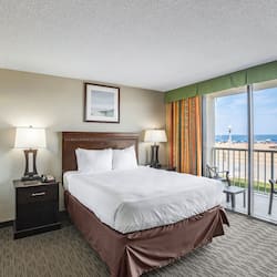 Suite, 1 Bedroom, Oceanfront | 1 bedroom, in-room safe, blackout drapes, iron/ironing board