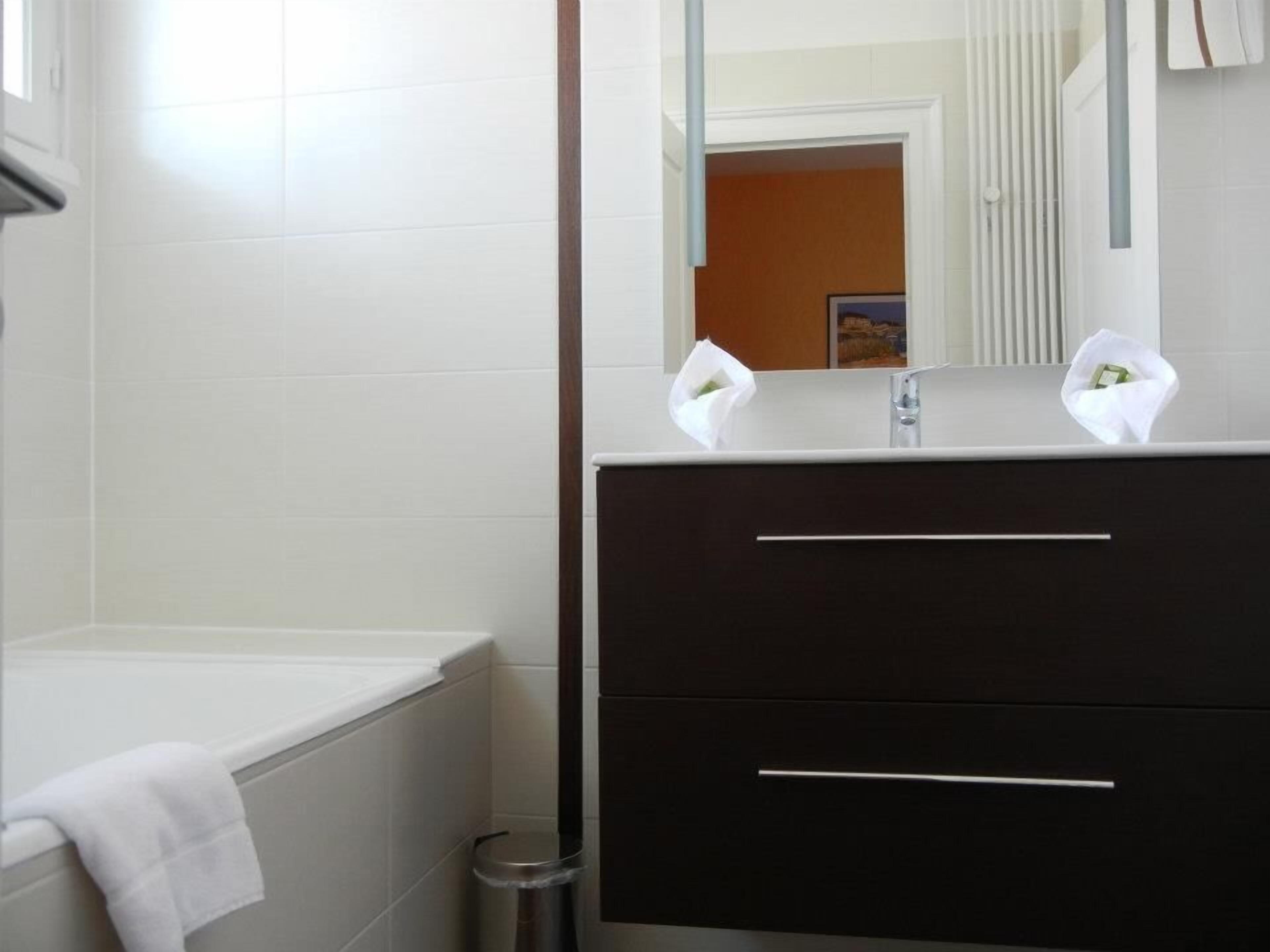 free toiletries, hair dryer, towels, toilet paper