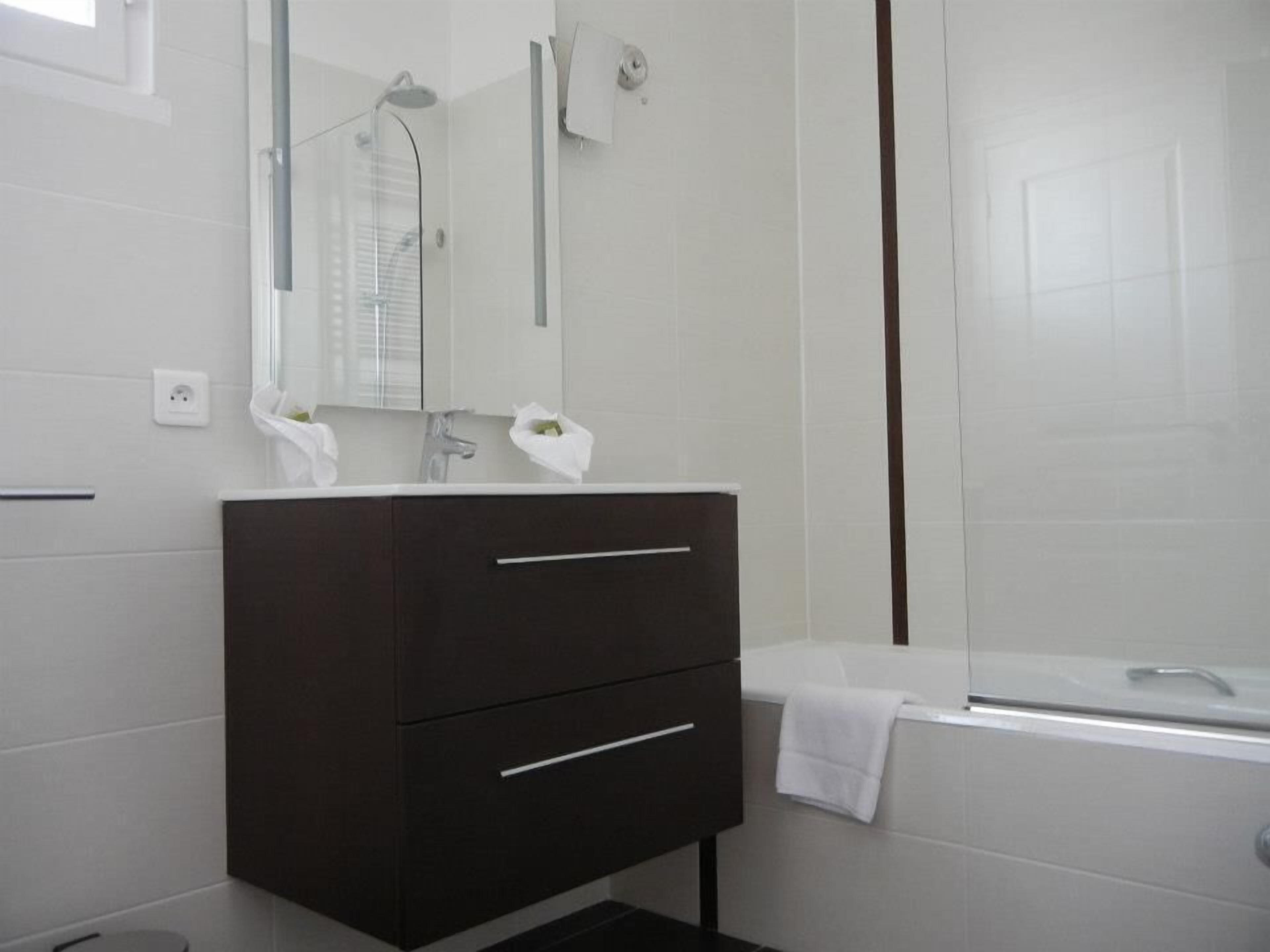 free toiletries, hair dryer, towels, toilet paper