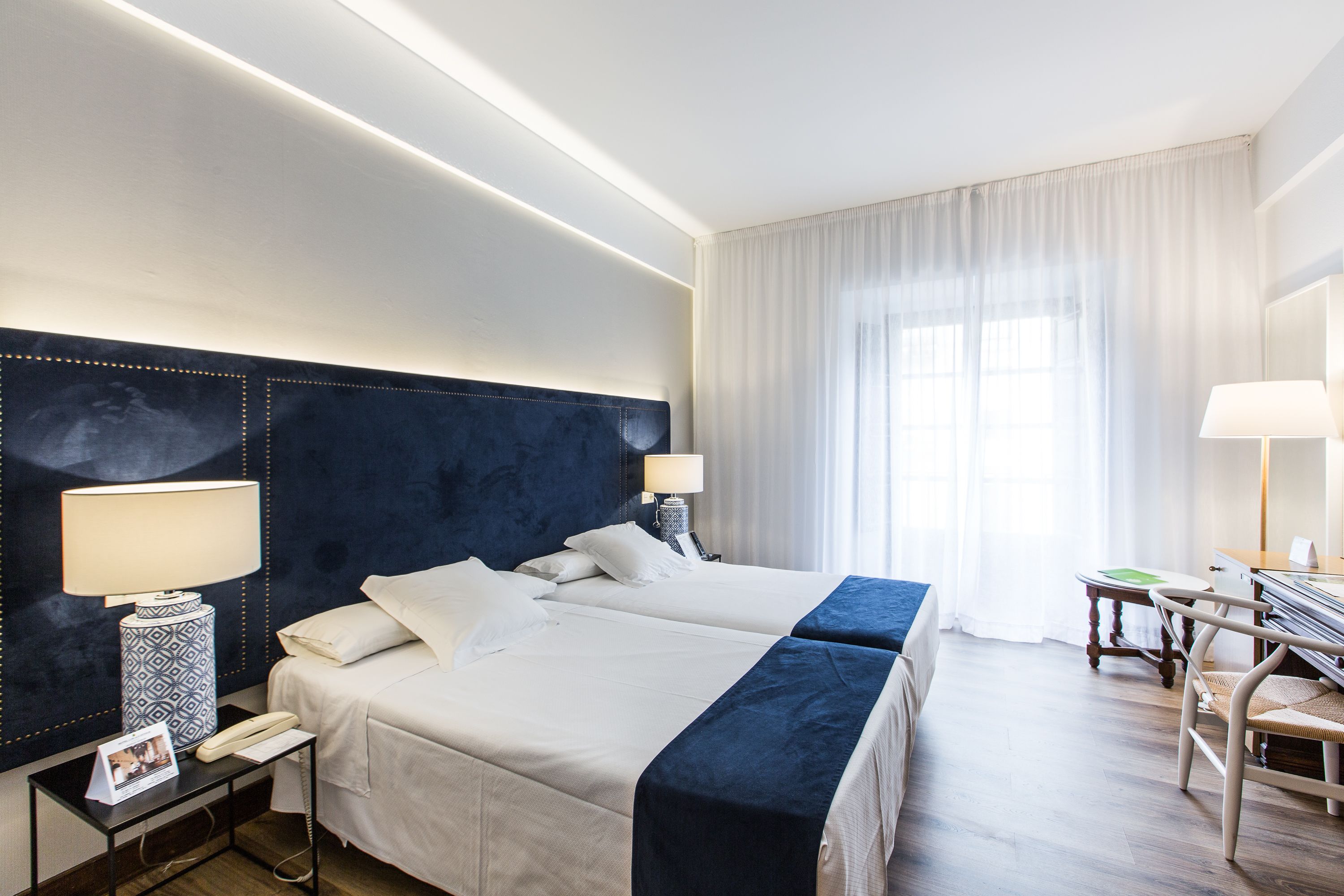 double or twin room | minibar, in-room safe, desk, blackout curtains