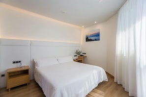 In-room safe, laptop workspace, blackout curtains, soundproofing