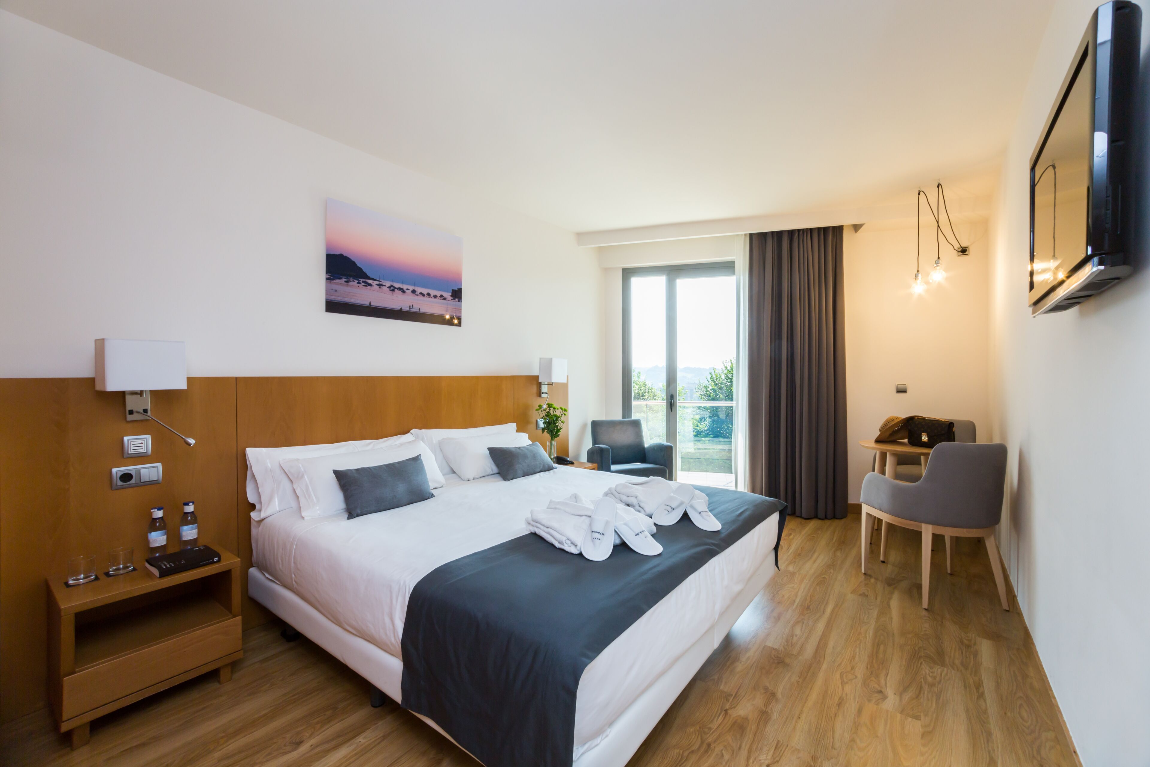 In-room safe, laptop workspace, blackout drapes, soundproofing