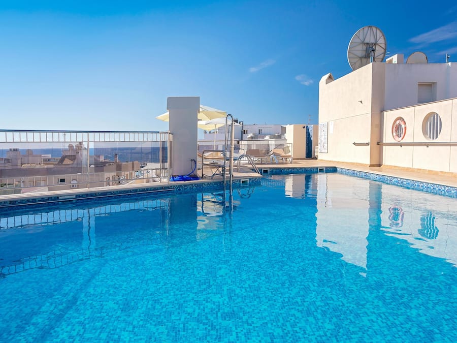 Outdoor pool, pool umbrellas, pool loungers