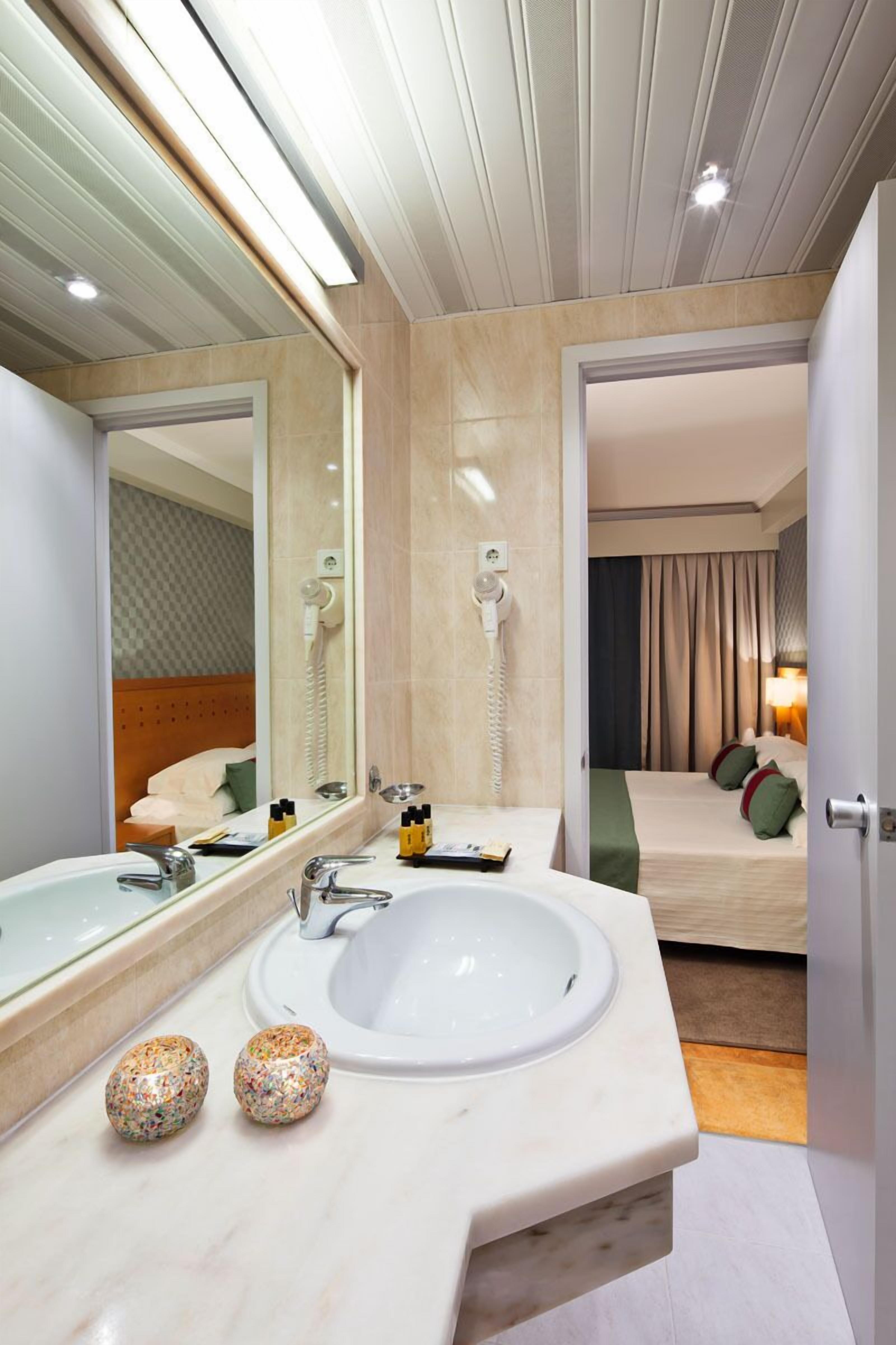 free toiletries, hair dryer, bidet, towels