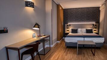 Triple Room | Down comforters, in-room safe, desk, laptop workspace