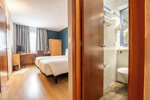 Desk, blackout curtains, free WiFi, bed sheets
