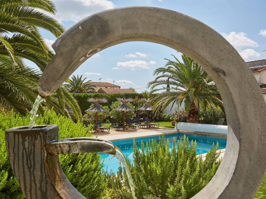 Seasonal outdoor pool, open 9:00 AM to 8:00 PM, pool umbrellas