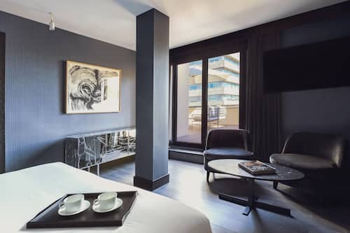 Rooftop Deluxe King with Terrace | Literie de qualité supérieure, minibar, coffres-forts dans les chambres