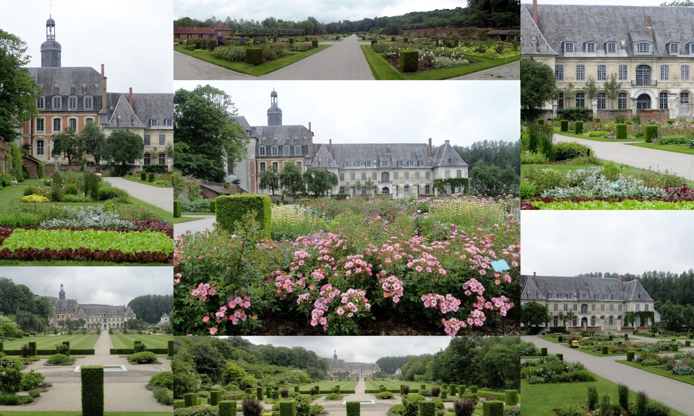 A historic building with a symmetrical garden layout, featuring neatly trimmed hedges and a variety of flowering plants.