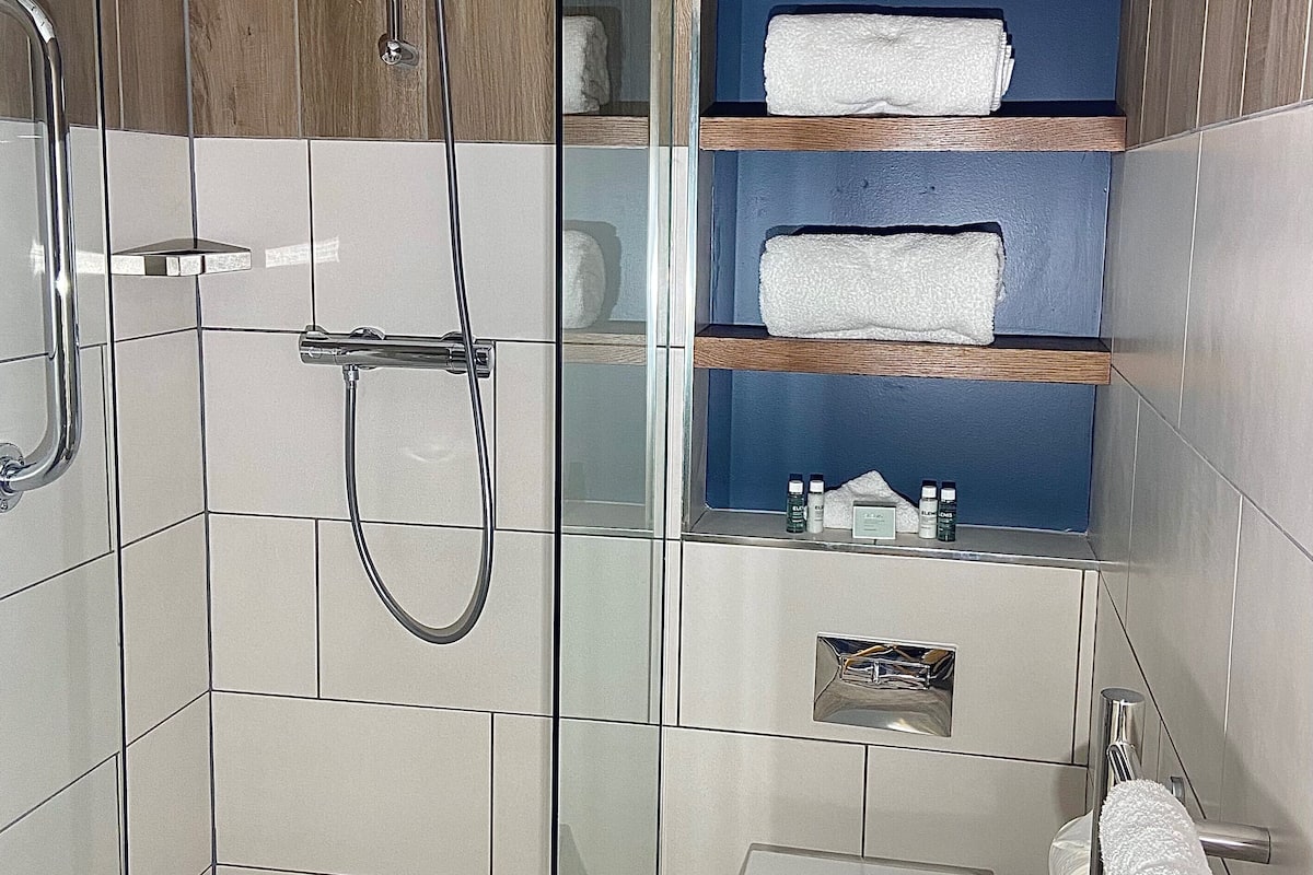free toiletries, hair dryer, slippers, towels