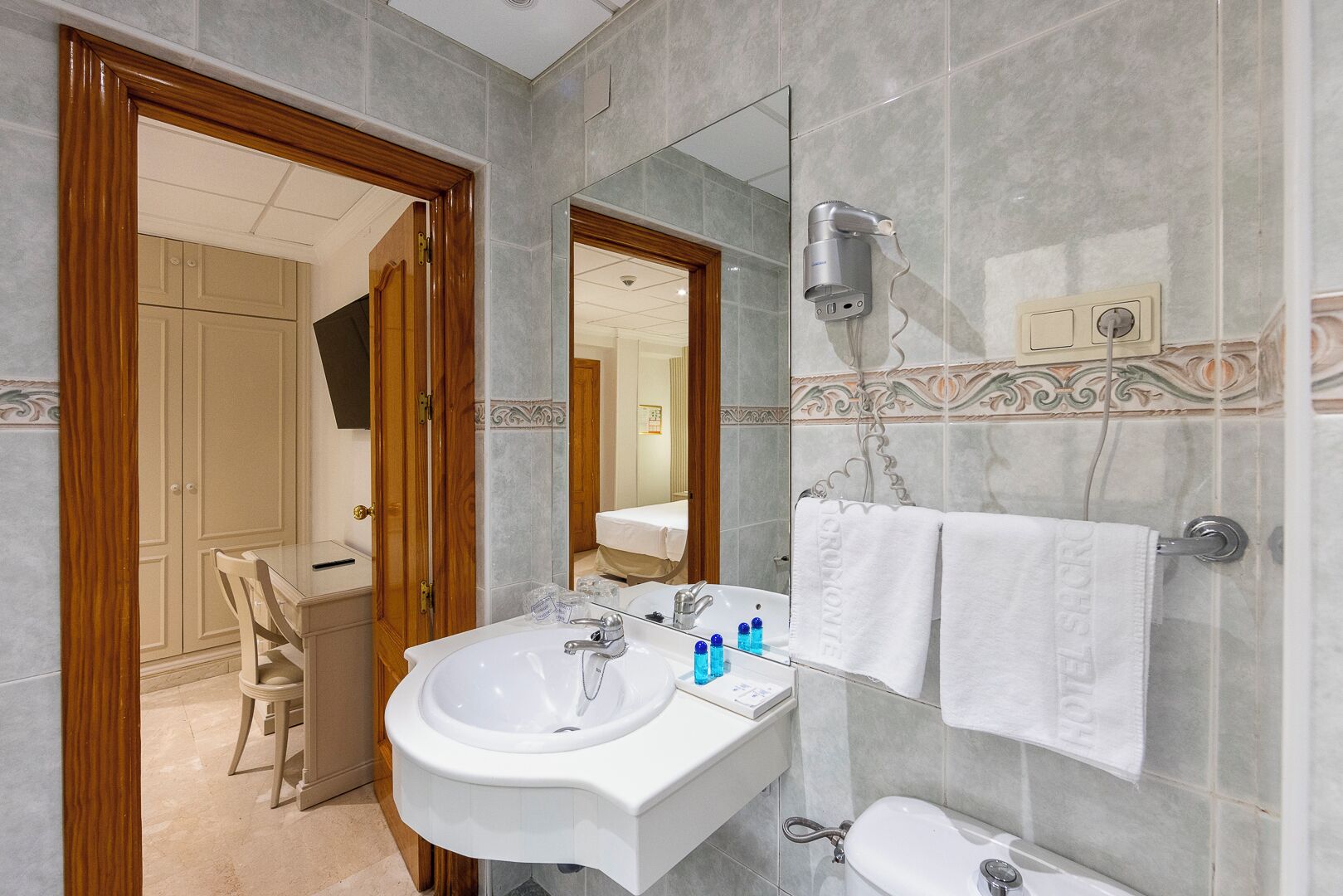 free toiletries, hair dryer, bidet, towels