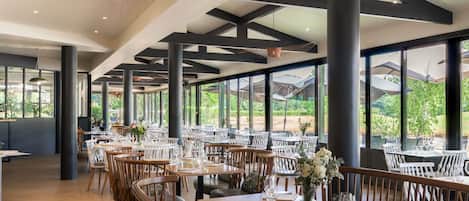 Breakfast, lunch, dinner served; French cuisine, golf course views