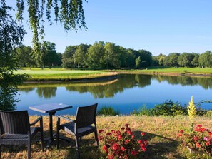 Breakfast, lunch, dinner served; French cuisine, golf course views 