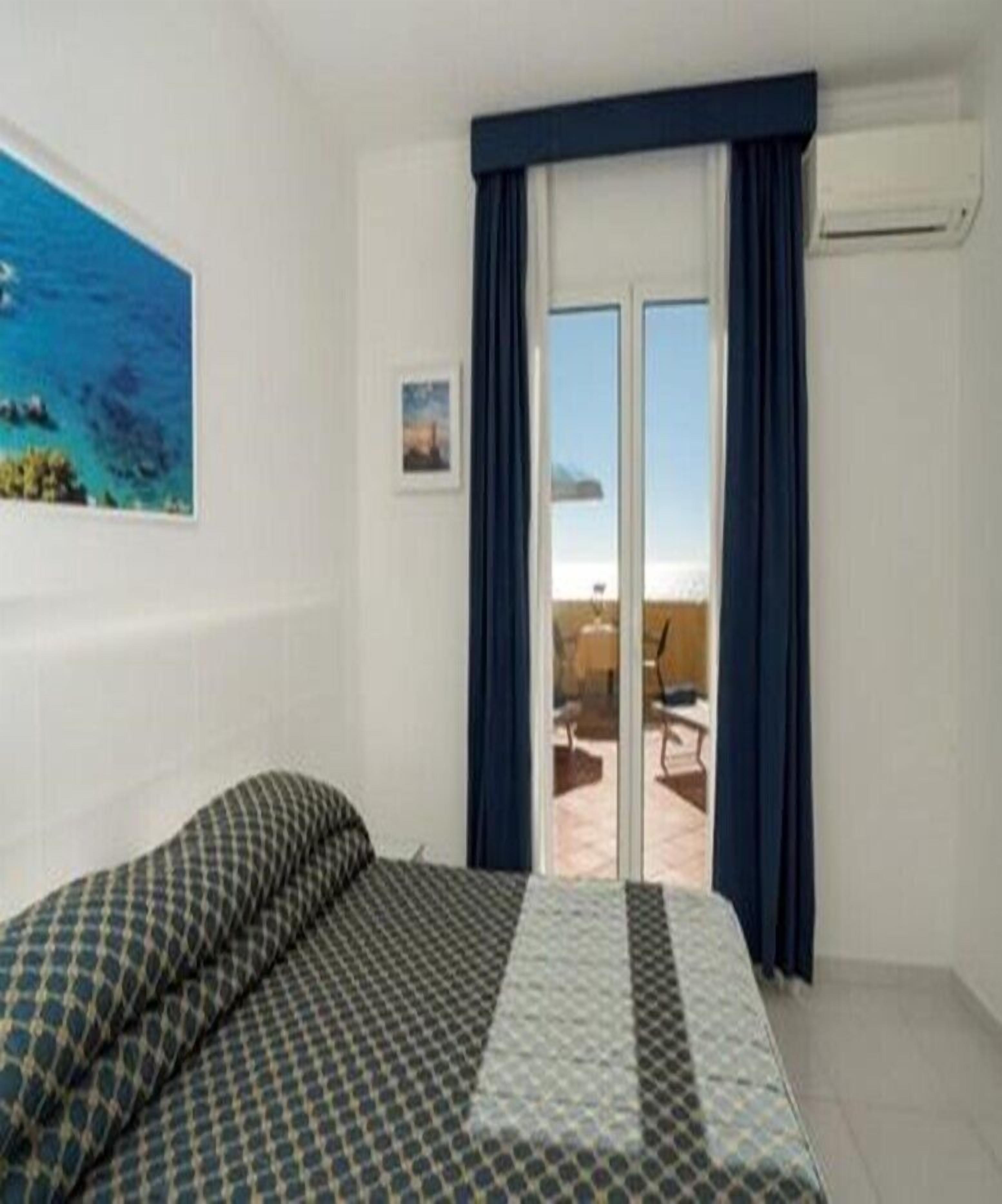 Junior Suite, Sea View | Hypo-allergenic bedding, minibar, in-room safe, desk